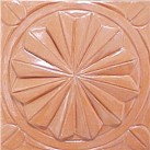 handmade terra cotta ceramic tile with a high relief design and a clear matte or gloss glaze