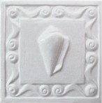 handmade ceramic tile with a high relief shell design and a one color glaze