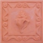 handmade terra cotta ceramic tile with a shell design and a clear gloss ot matte glaze