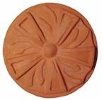 handmade terra cotta ceramic tile with a high relief design and a clear gloss or matte glaze