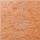 handmade terra cotta ceramic tile with a high relief flower design