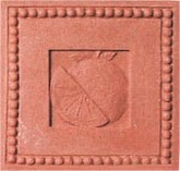 handmade ceramic terra cotta tile with a shell design and a clear gloss or matte glaze