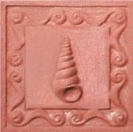 handmade terra cotta ceramic tile with a shell design and a clear gloss or matte glaze