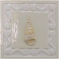 handmade ceramic tile with a high relief shell design and a multi-colored glaze