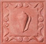 handmade terra cotta ceramic tile with a shell design and a clear gloss or matte glaze
