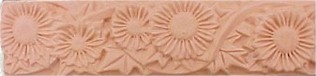 handmade terra cotta trim piece ceramic tile with a high relief design and a clear gloss or matte glaze