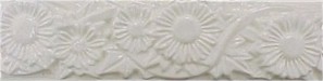 handmade designer trim piece ceramic tile with a high relief design and a one color glaze