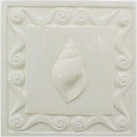 handmade ceramic tile with a high relief shell design and a one color glaze