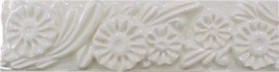 handmade designer trim piece ceramic tile with a high relief design and a one color glaze