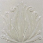 handmade ceramic tile with a high relief flower design and a one color glaze